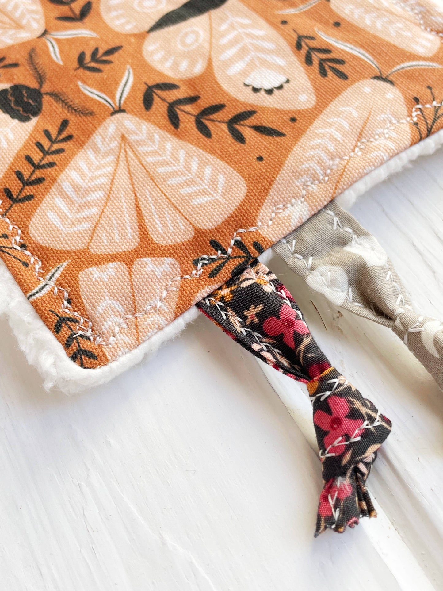 Folk Moth Canvas Crinkle Tag Toy Terra Cotta and Black
